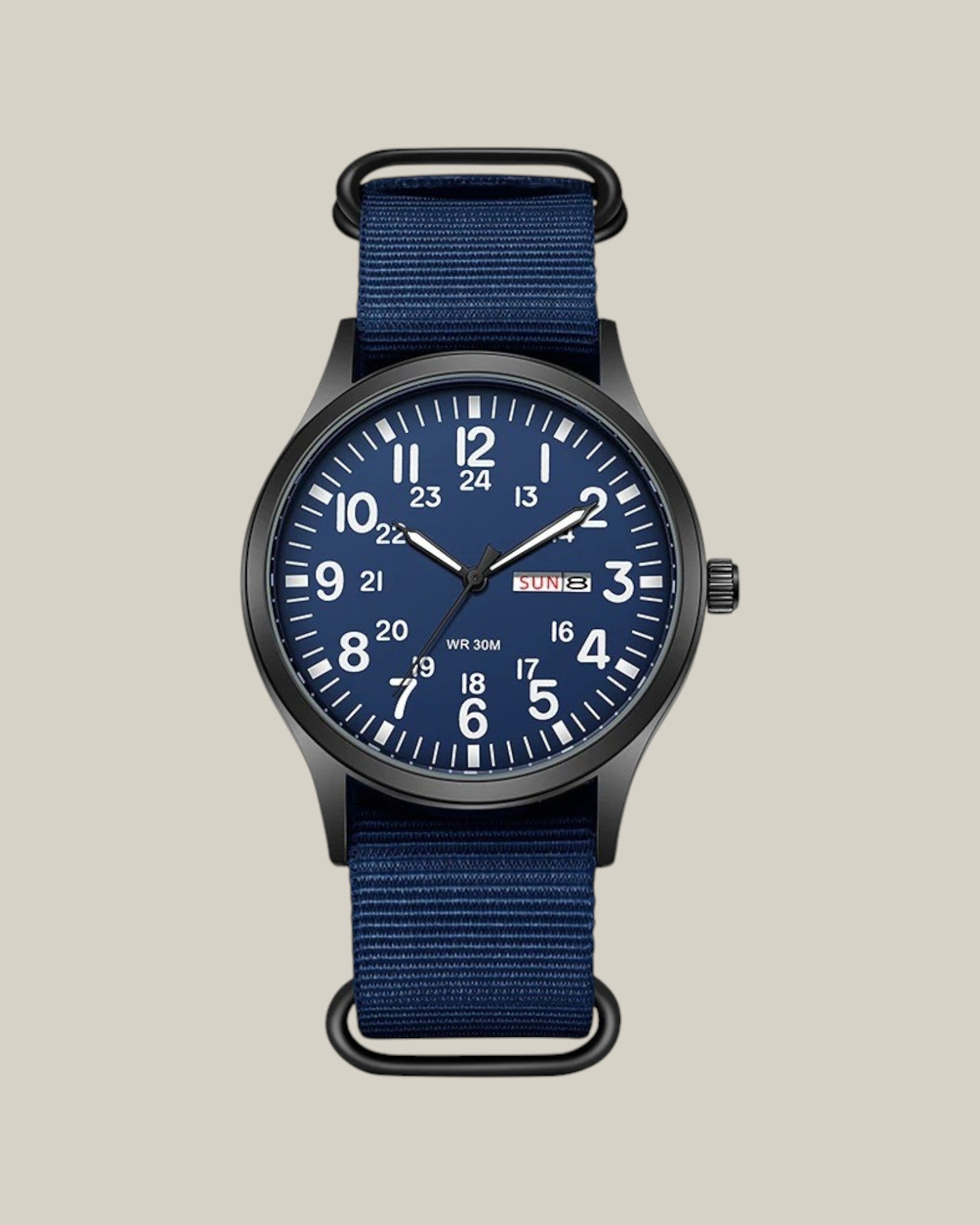 Relógio masculino com pulseira de nylon azul e mostrador azul da marca Bravio. O relógio tem calenário e ponteiros luminosos no escuro.